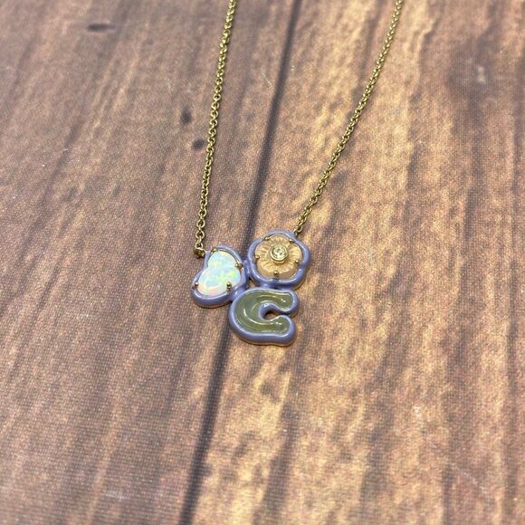COACH GOLD AND PURPLE CHARM NECKLACE DH70 - Picture 1 of 4